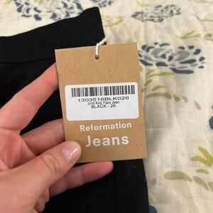 Reformation black kick flare jeans